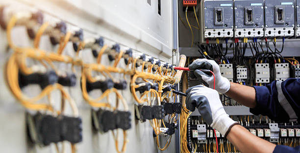 Professional Electrician technician working in Welby, CO